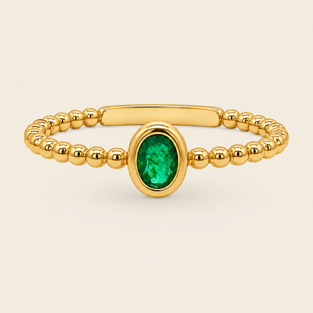Noa – Anillo Bezel de Oro Amarillo 14k con Esmeralda Ovalada