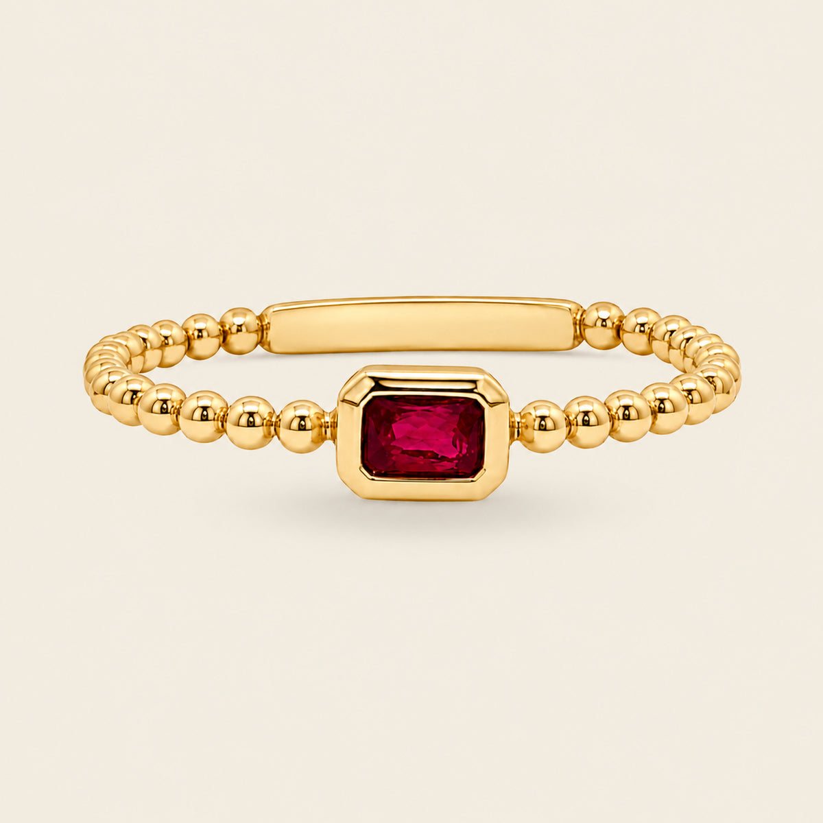 Delfina – Anillo Bezel de Bolitas de Oro Amarillo 14k con Rubí