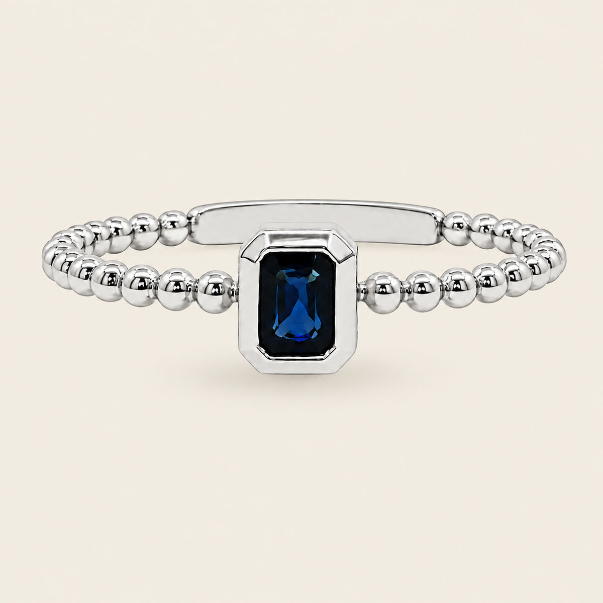 Ondina – Anillo Bezel de Bolitas de Oro Blanco 14k con Zafiro