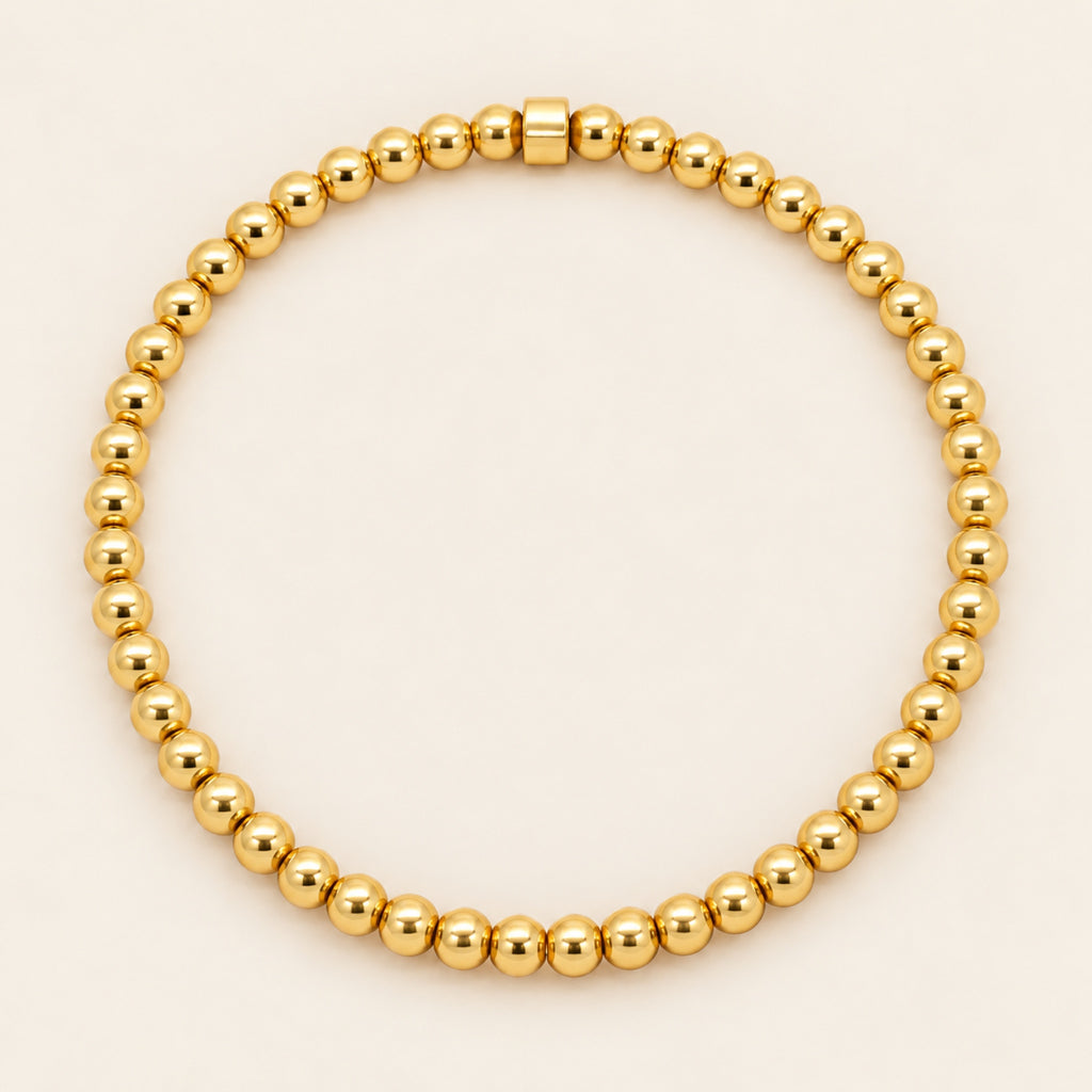 Pulsera Elástica de Oro Laminado con Esferas y Barra