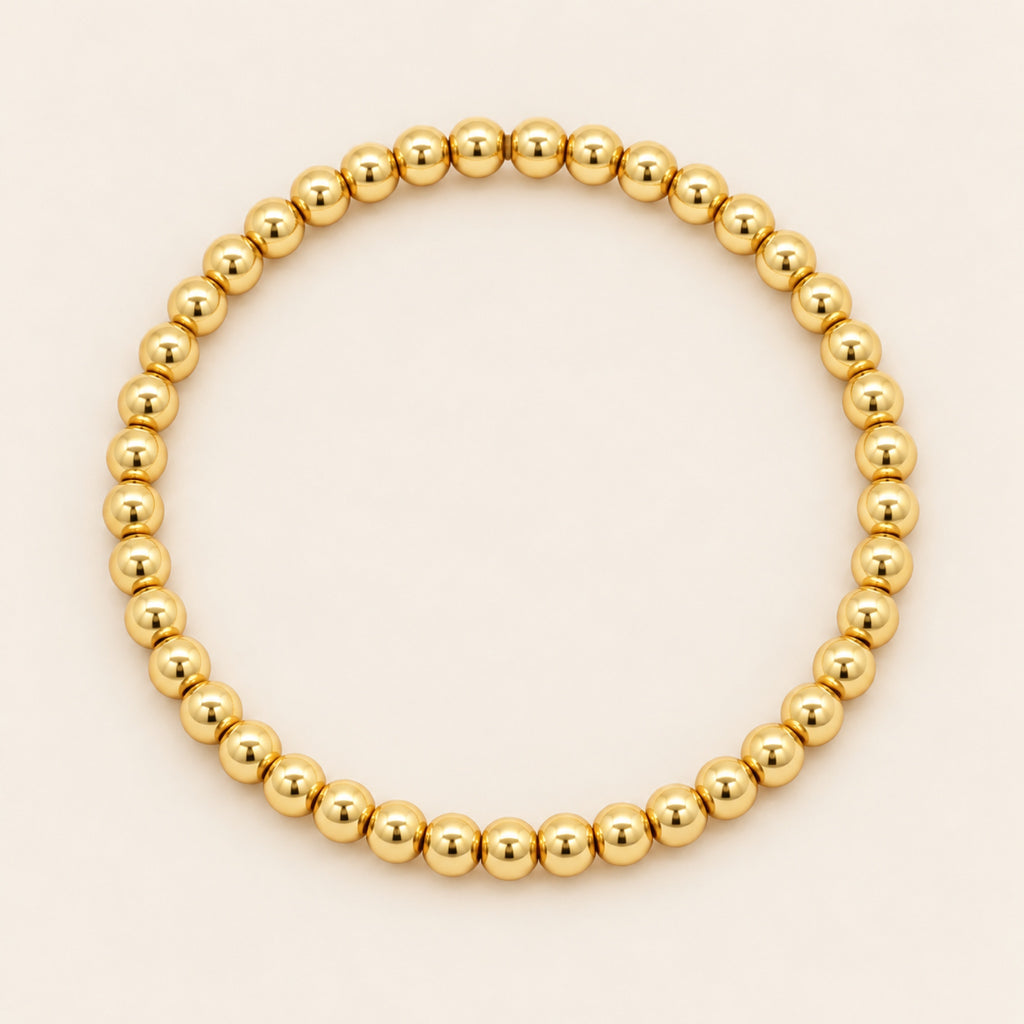 Pulsera Elástica de Oro Laminado con Esferas Pequeñas