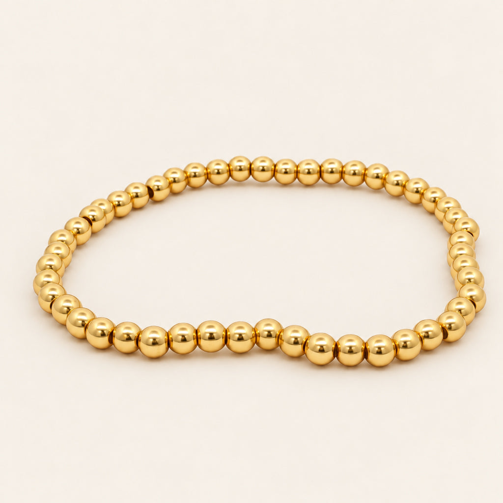 Pulsera Elástica de Oro Laminado con Esferas Pequeñas