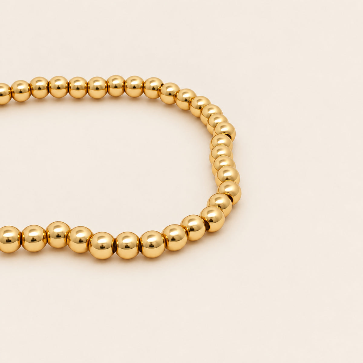 Pulsera Elástica de Oro Laminado con Esferas Pequeñas