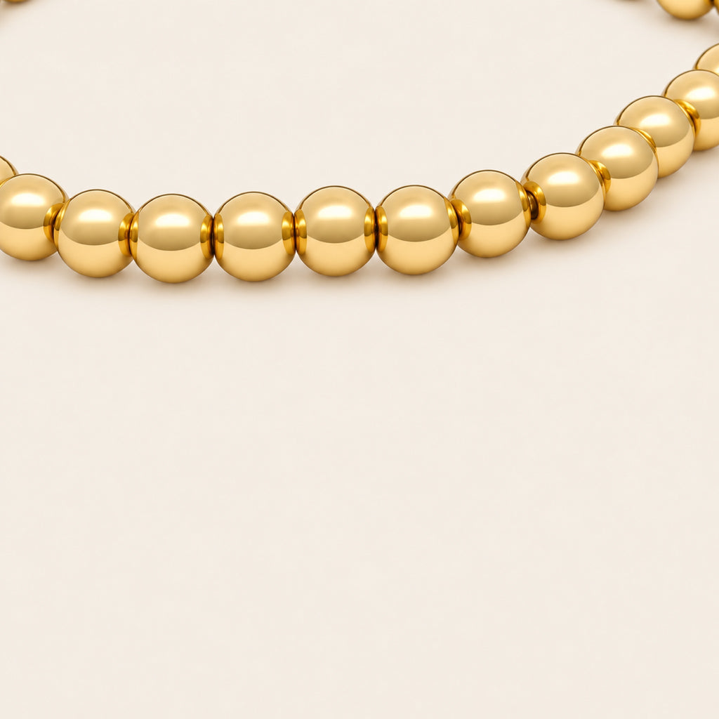 Pulsera Elástica de Oro Laminado con Esferas