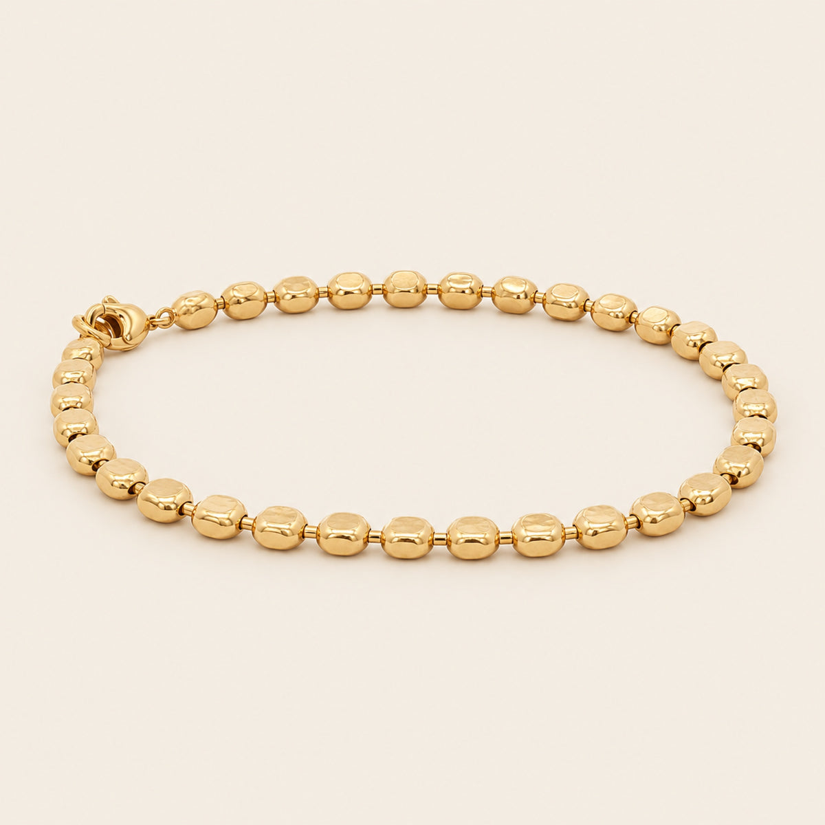 Pulsera de Oro Laminado con Bolitas Planas Texturizadas