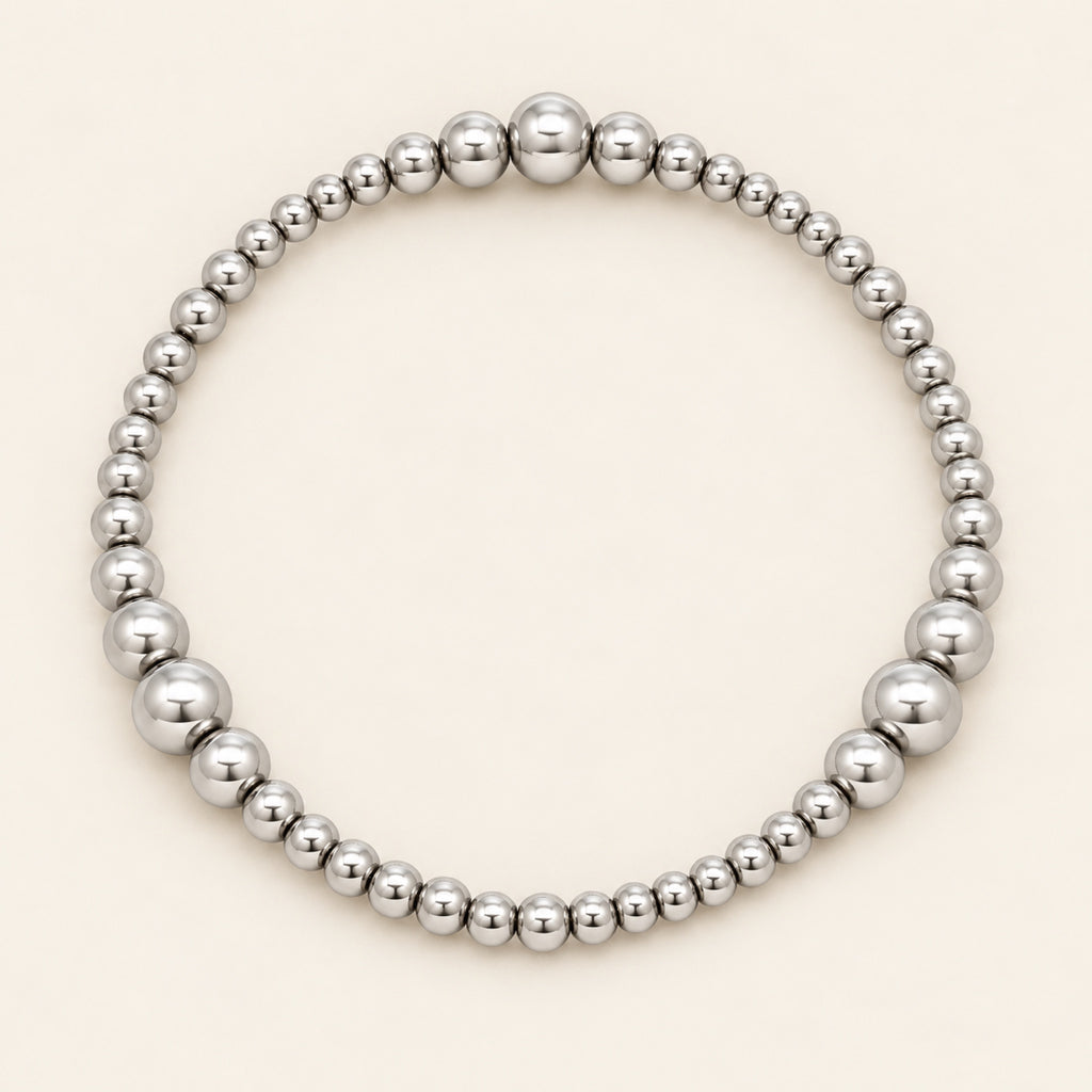 Pulsera Elástica de Oro Laminado Plateado con Esferas Graduales