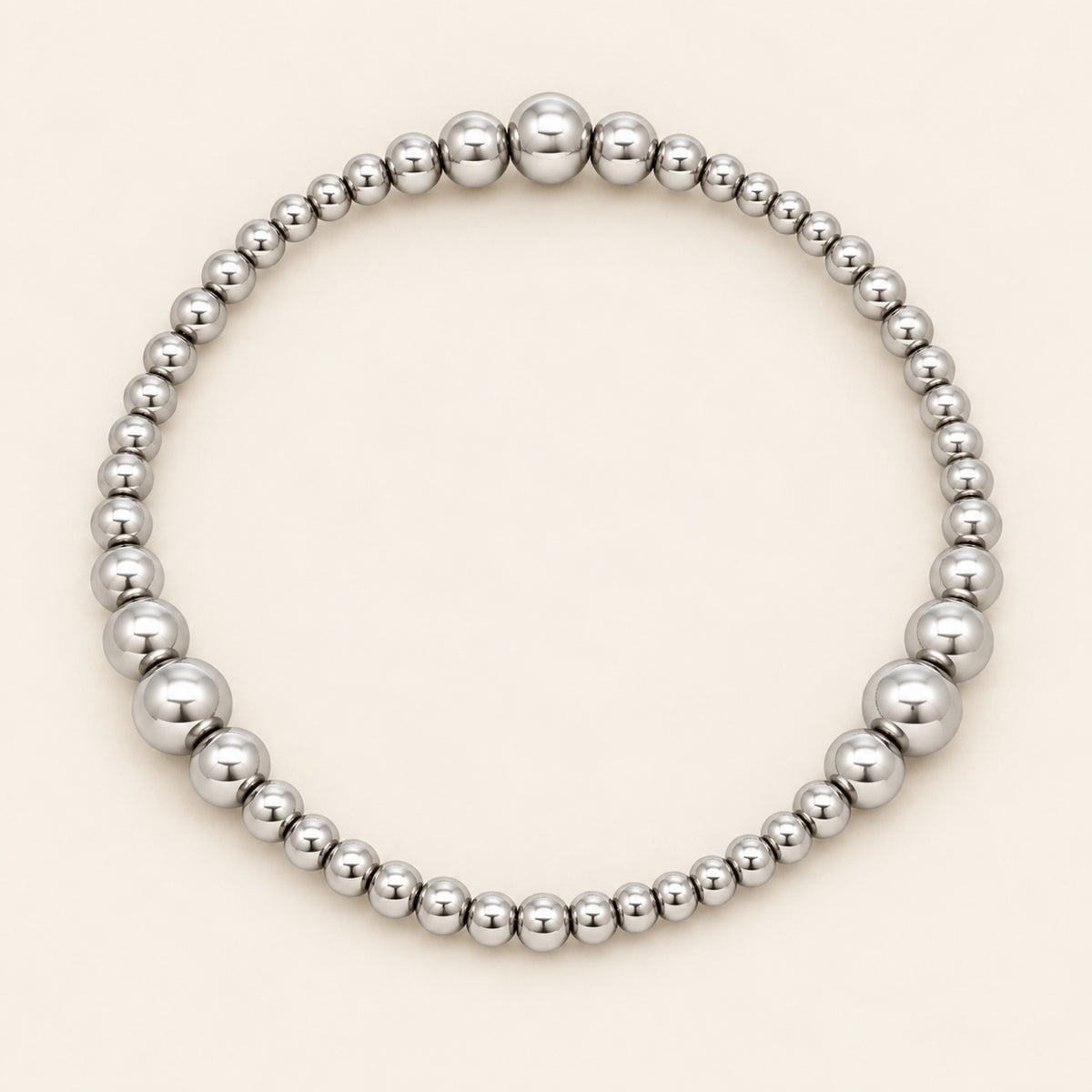 Pulsera Elástica de Oro Laminado Plateado con Esferas Graduales