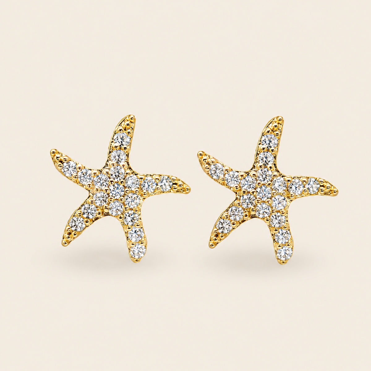 Aretes de Estrella de Mar de Oro Laminado 18k con Brillantes