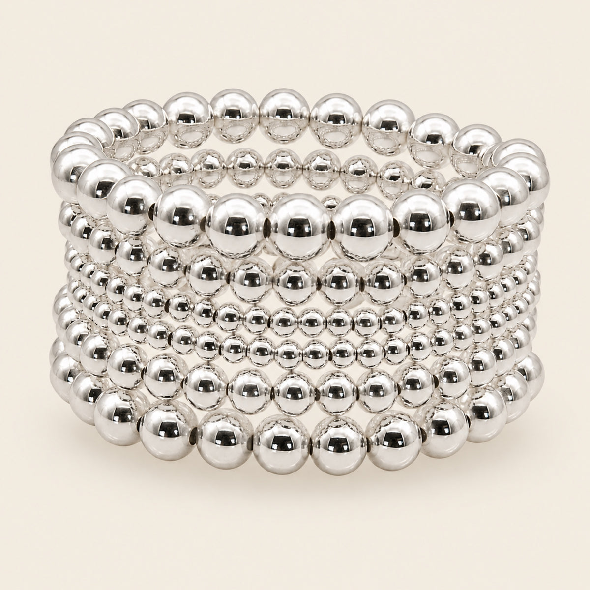 Pulsera Elástica de Oro Laminado Plateado con Esferas de Seis Vueltas