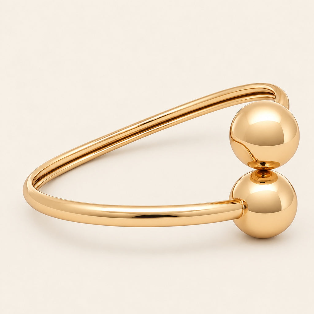 Pulsera Rígida de Oro Laminado con Dos Esferas