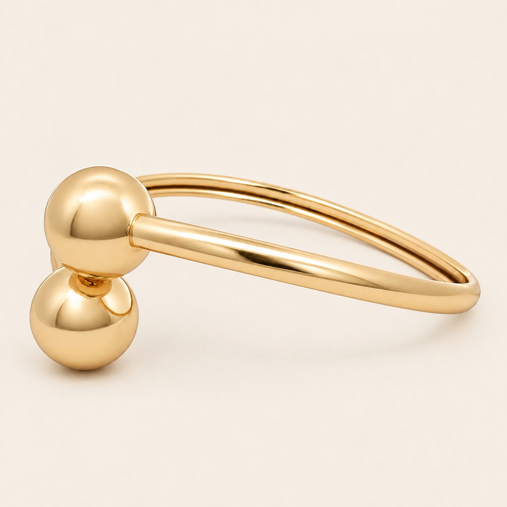 Pulsera Rígida de Oro Laminado con Dos Esferas