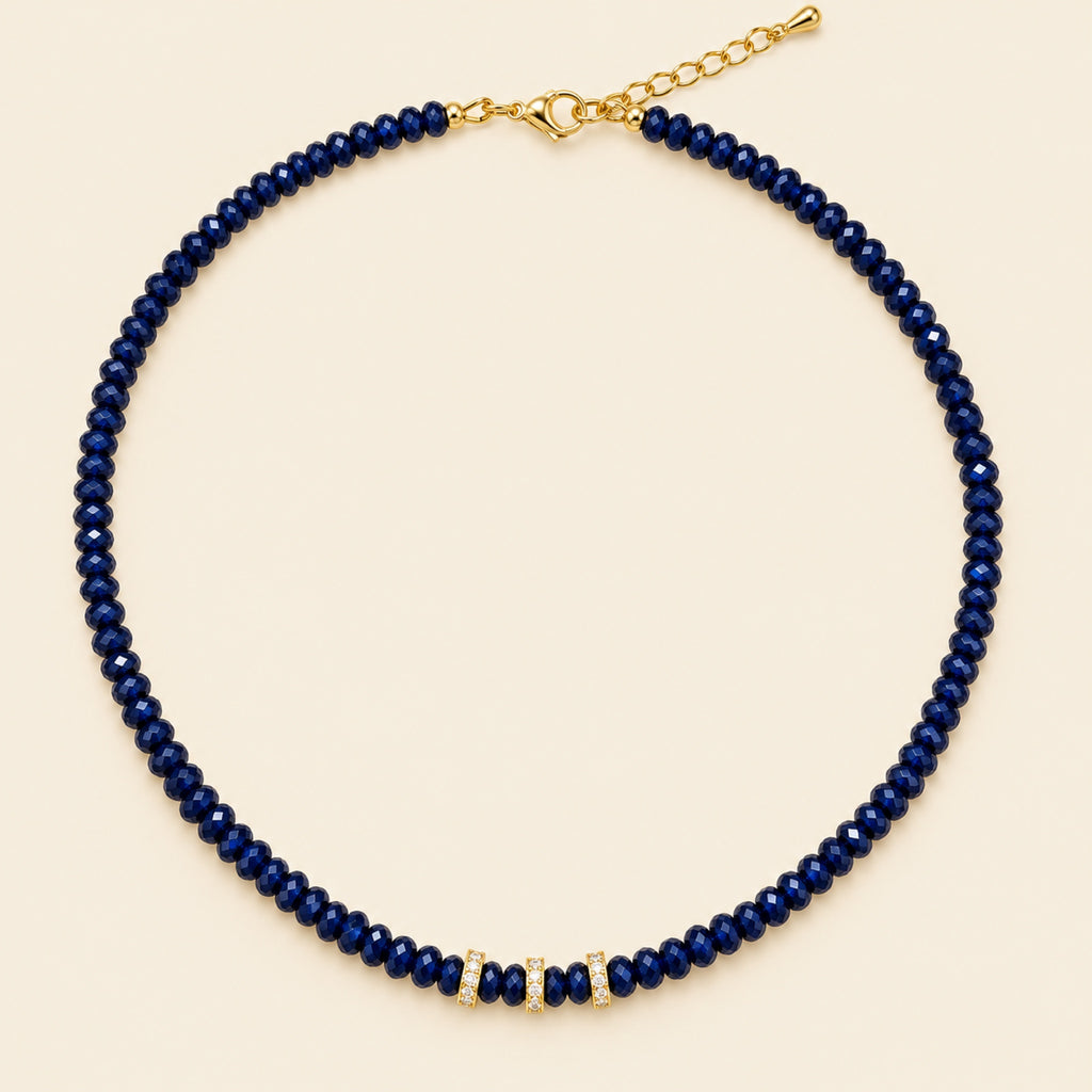 Gala – Collar Dorado con Cuentas Facetadas Azules y Circonias