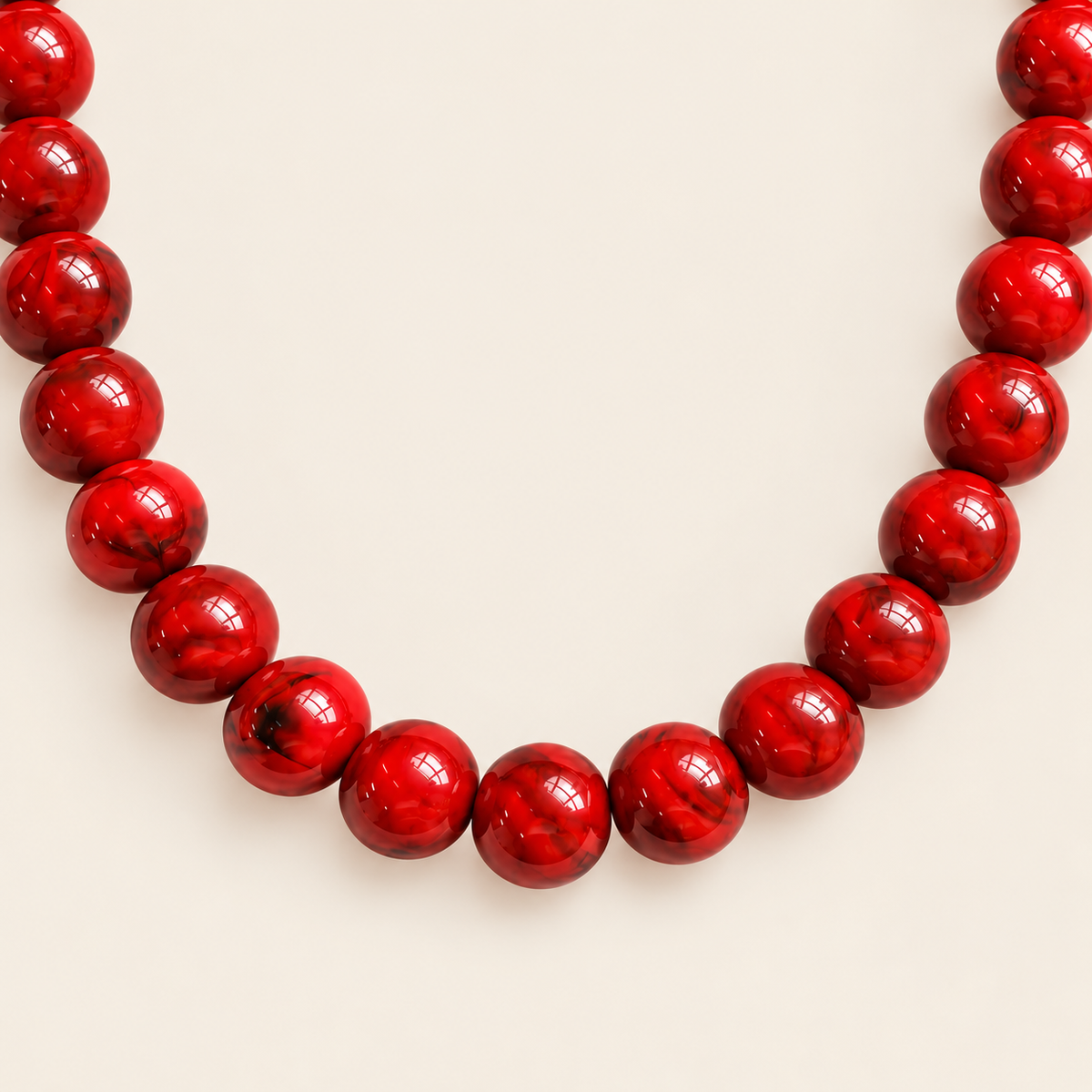 Bombón – Collar Dorado con Esferas de Resina Rojas