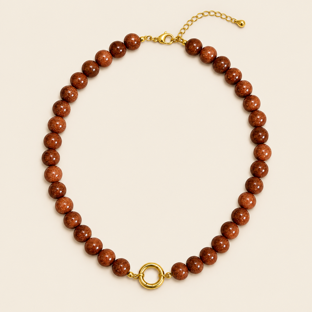 Estrellas – Collar Dorado con Goldstone Café