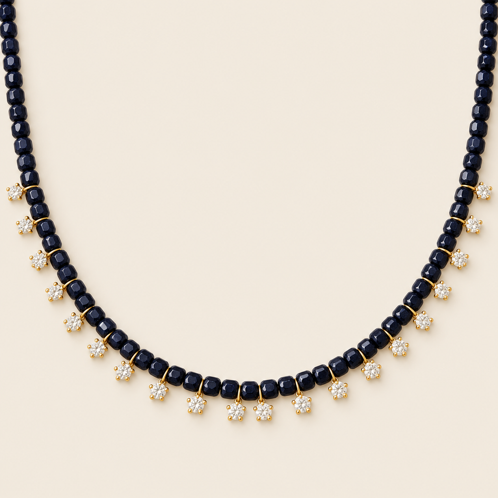 Estrellas – Collar Dorado con Goldstone Azul y Dijes de Estrella