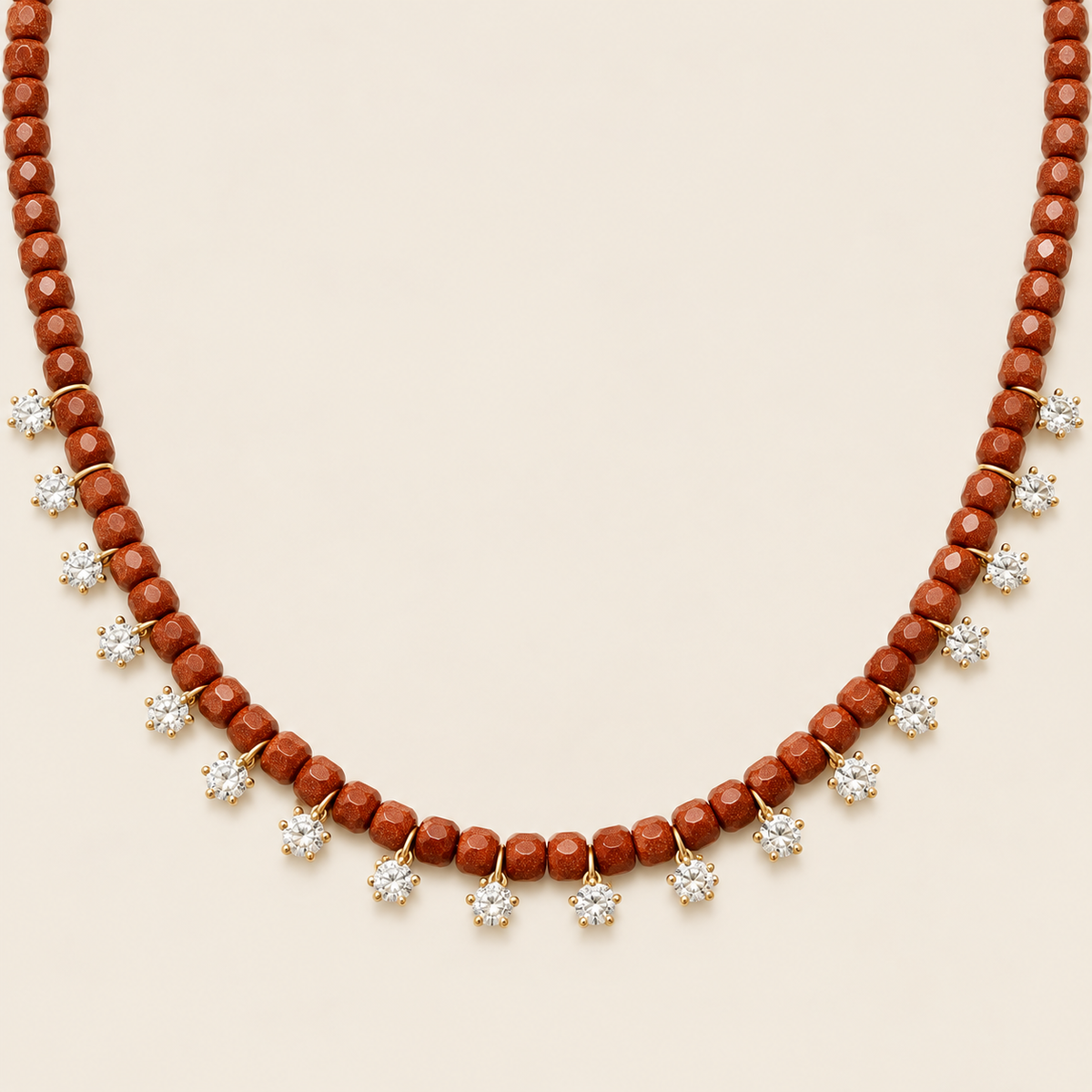 Estrellas – Collar Dorado con Goldstone Café y Dijes de Estrella