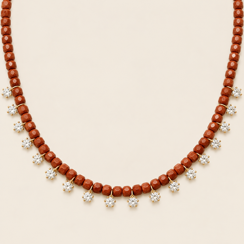 Estrellas – Collar Dorado con Goldstone Café y Dijes de Estrella
