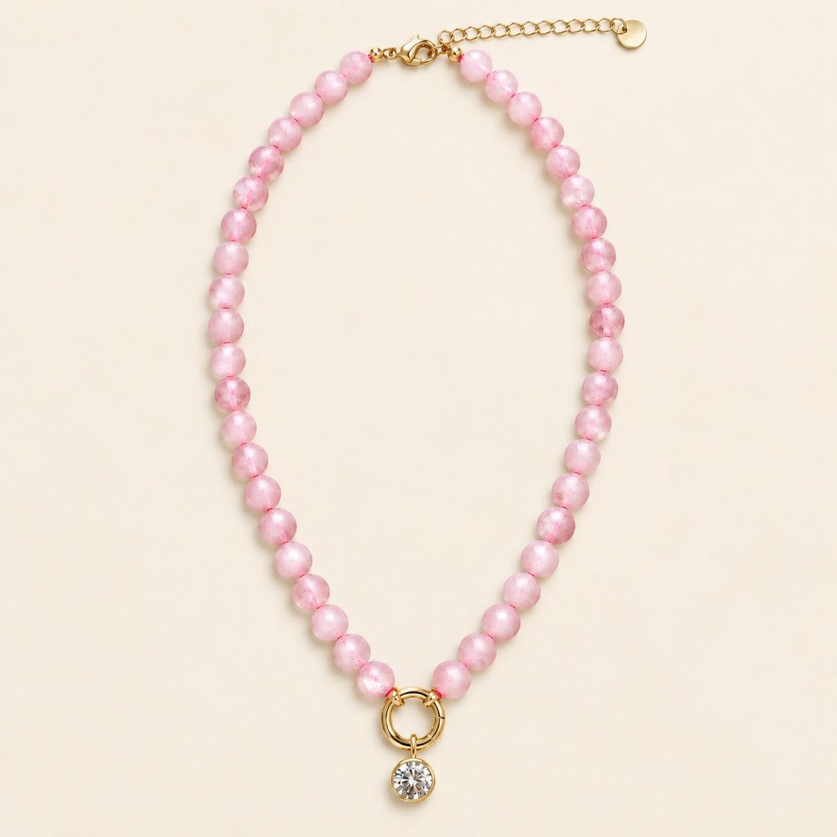 Lucero – Collar Dorado con Cuentas Rosas y Dije de Circonia