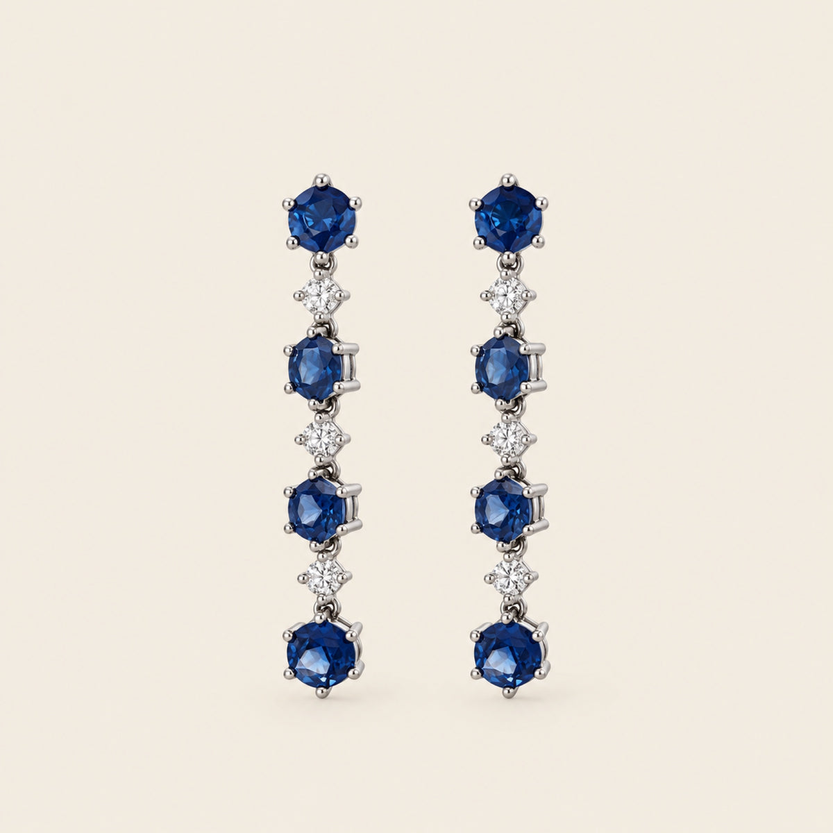 Aretes Largos de Oro Blanco 18k con Zafiros y Diamantes