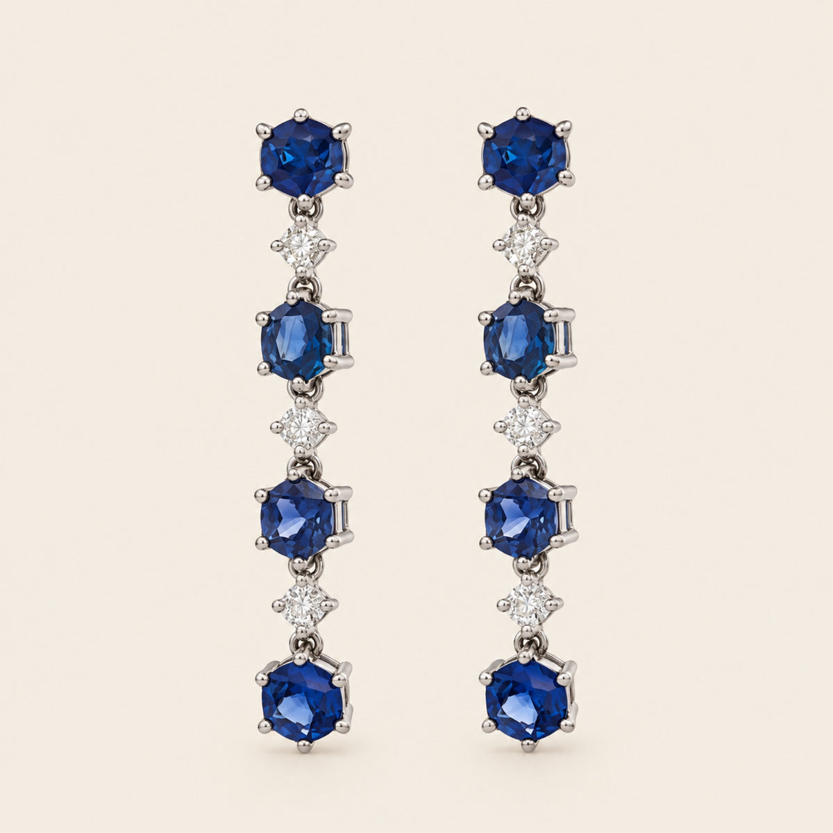 Aretes Largos de Oro Blanco 18k con Zafiros y Diamantes