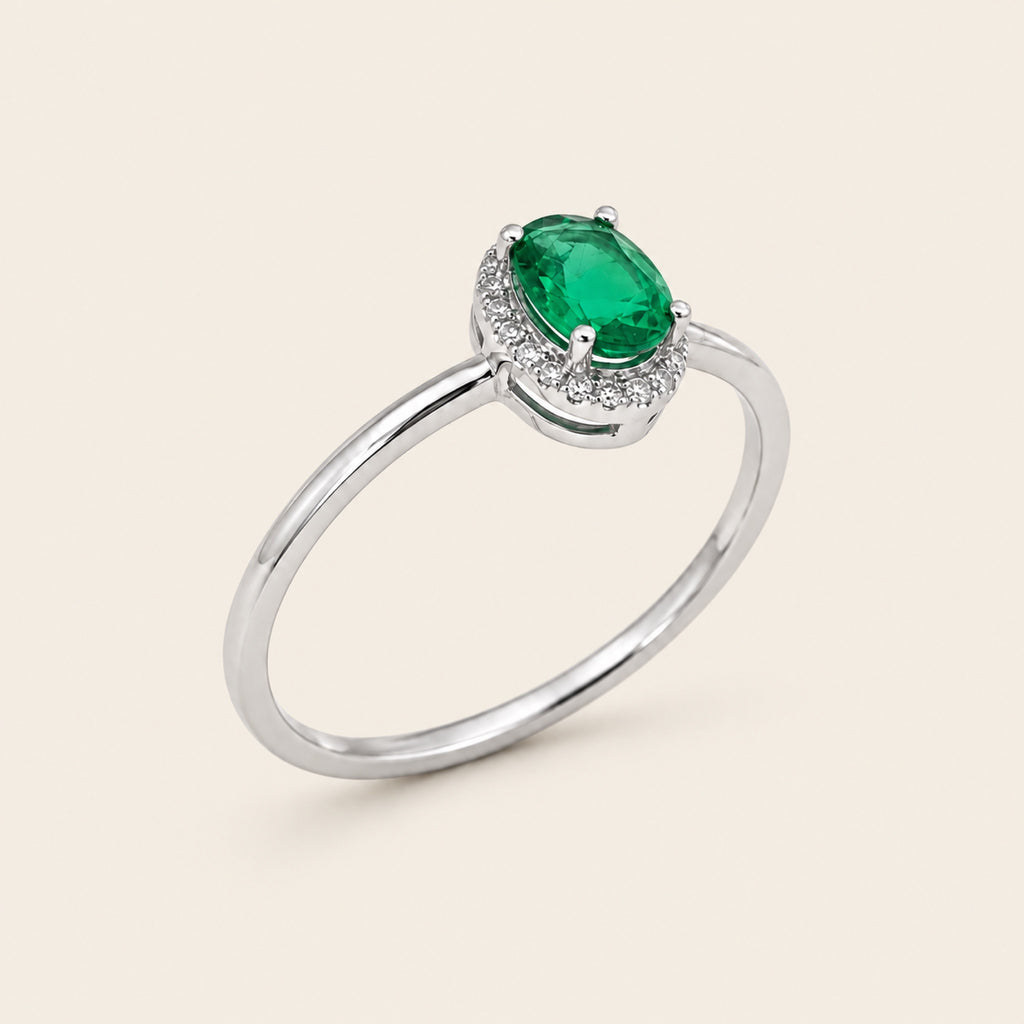 Victoria – Anillo Halo de Oro Blanco 18k con Esmeralda