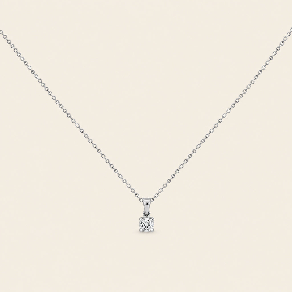 Dije de Oro Blanco 14k con Diamante Solitario