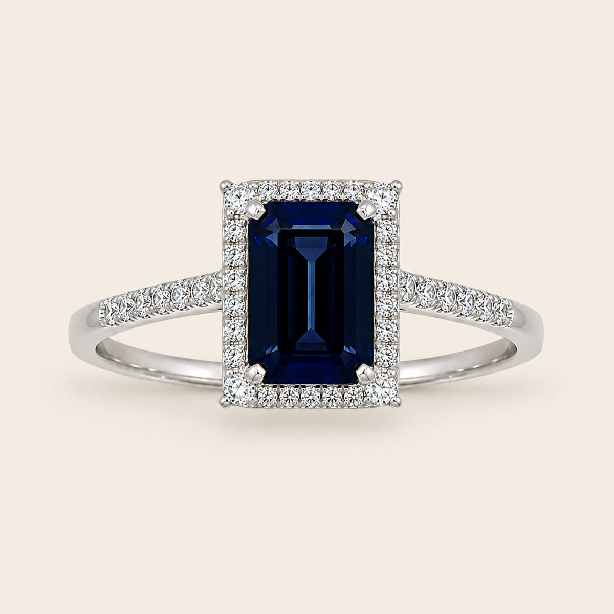 Paloma – Anillo Halo de Oro Blanco 14k con Zafiro Azul