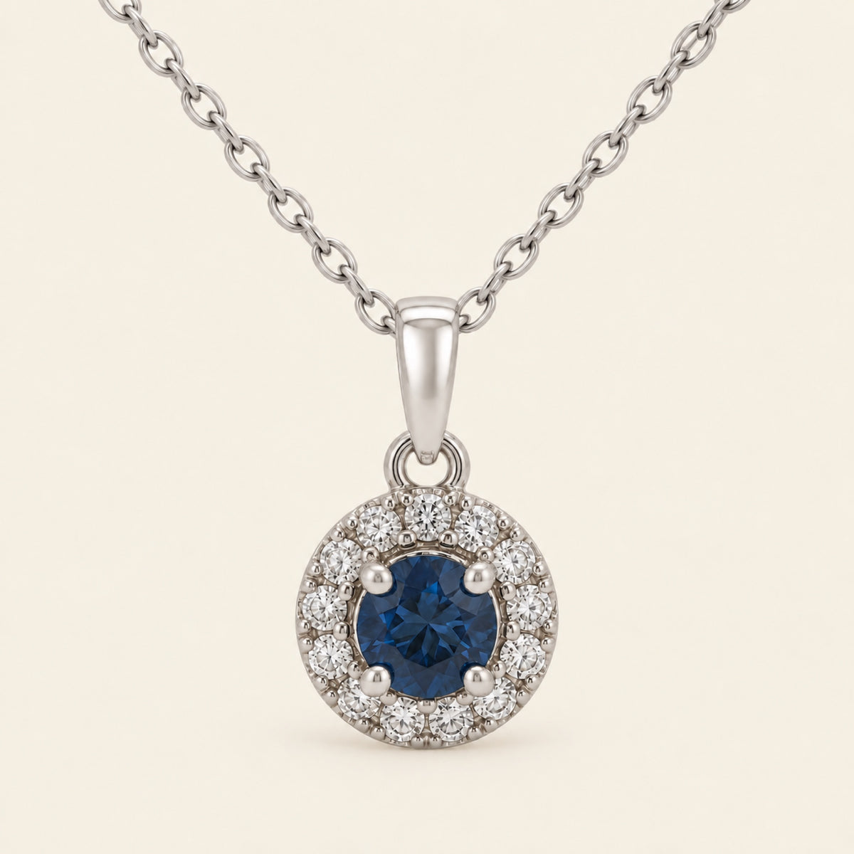 Dije de Oro 14k con Piedra Redonda y Halo de Diamantes